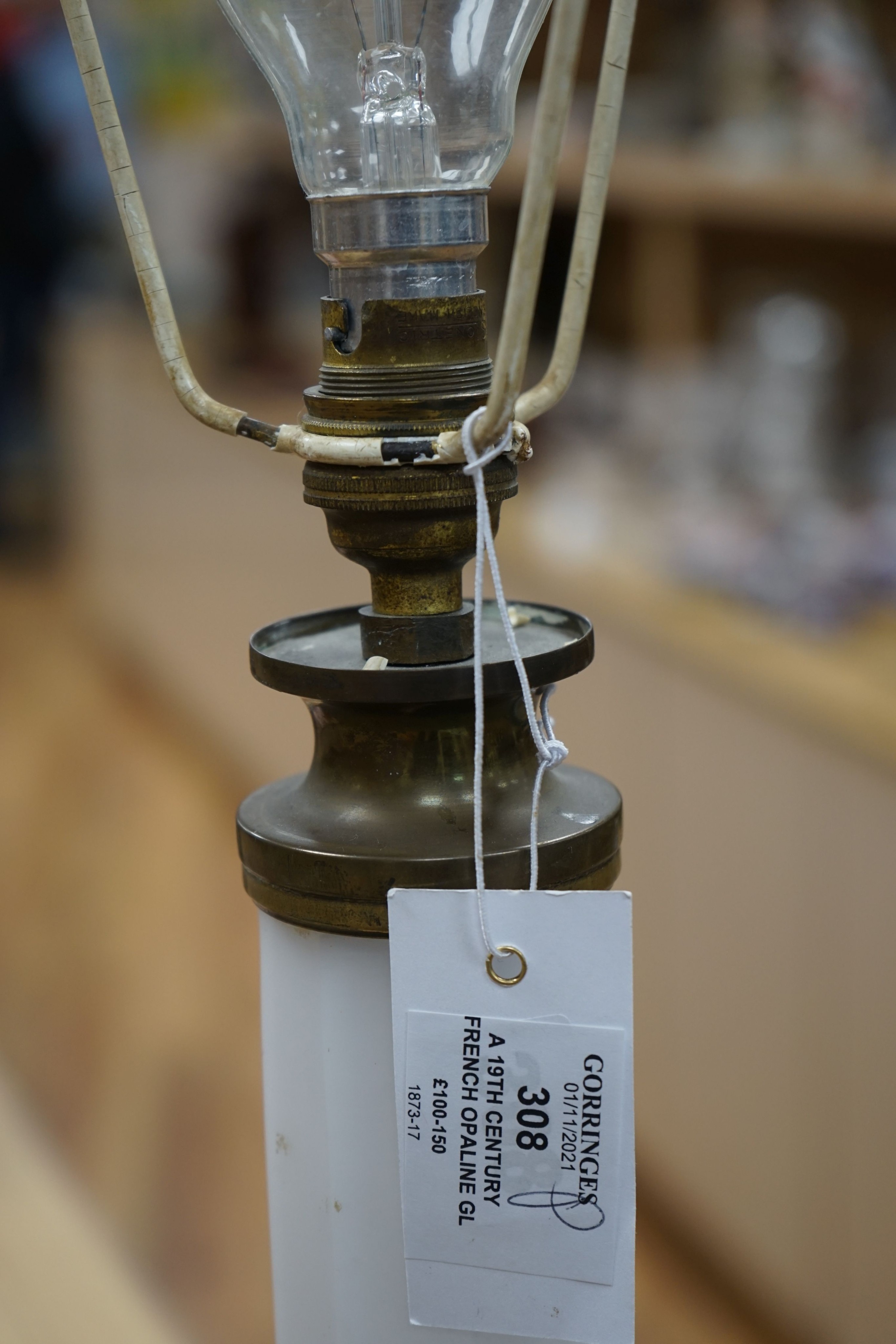 A 19th century French opaline glass lamp converted to electric 54cm